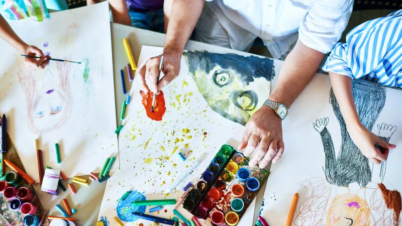 Children painting together